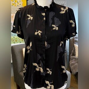 Tahari short-sleeve blouse with a crane print in a black